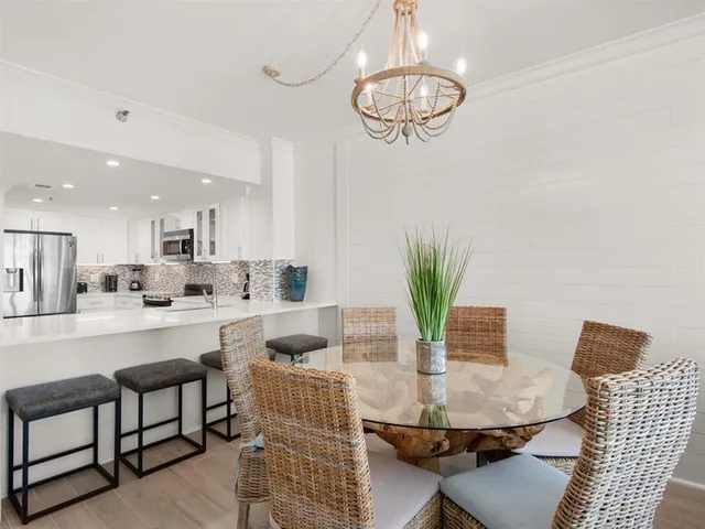 a view of a dining room with furniture