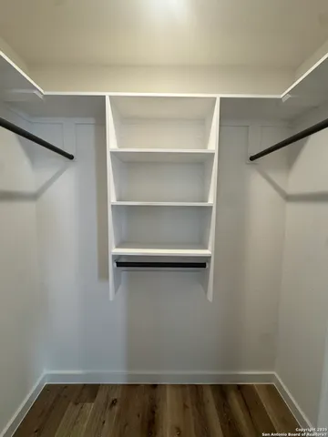 a view of an empty walk in closet