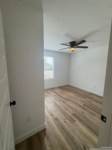 a view of a room with rack on the wall