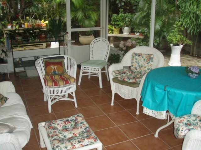 251 Bunker Ranch Road West Palm Beach, FL 33405 - Photo 15 of 18 15 Screened porch 2