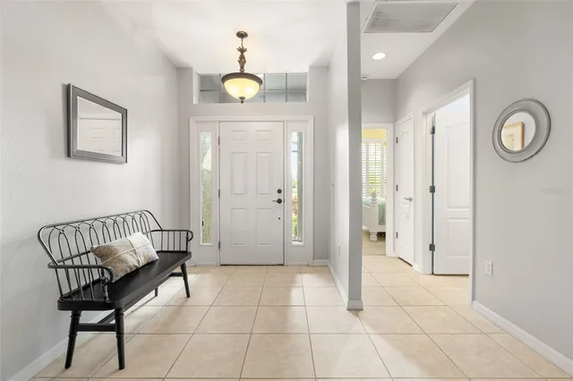 a view of room with furniture and wooden floor