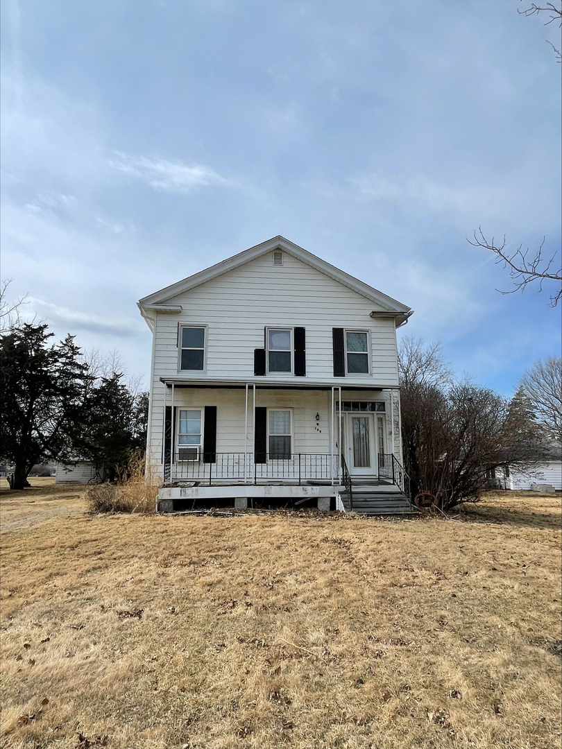 106 South East Street Dover, IL 61323 - Photo 1 of 9 a front view of a house with a yard