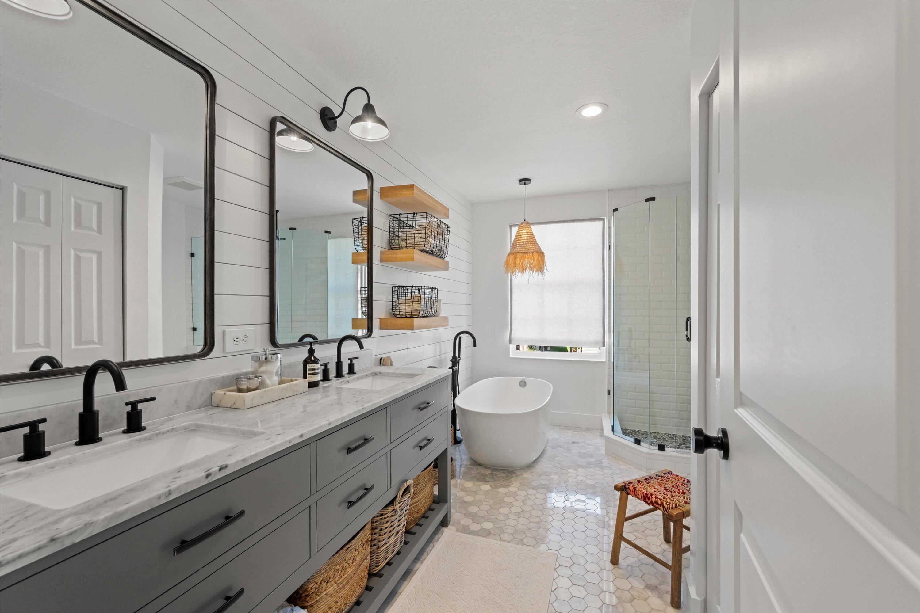 4138 Bluff Harbor Way Wellington, FL 33449 - Photo 25 of 48 a bathroom with a granite countertop sink mirror vanity and toilet