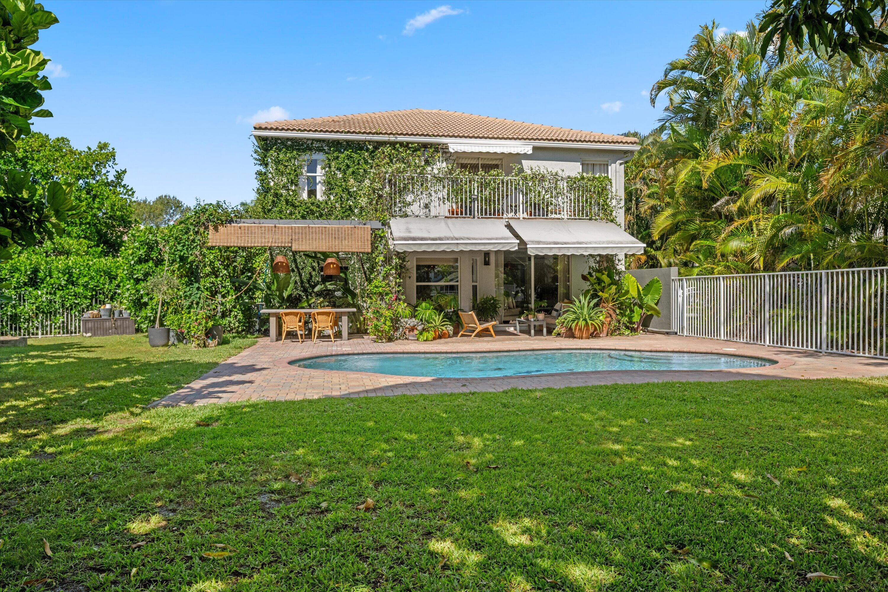 4138 Bluff Harbor Way Wellington, FL 33449 - Photo 38 of 48 a view of a swimming pool with a patio
