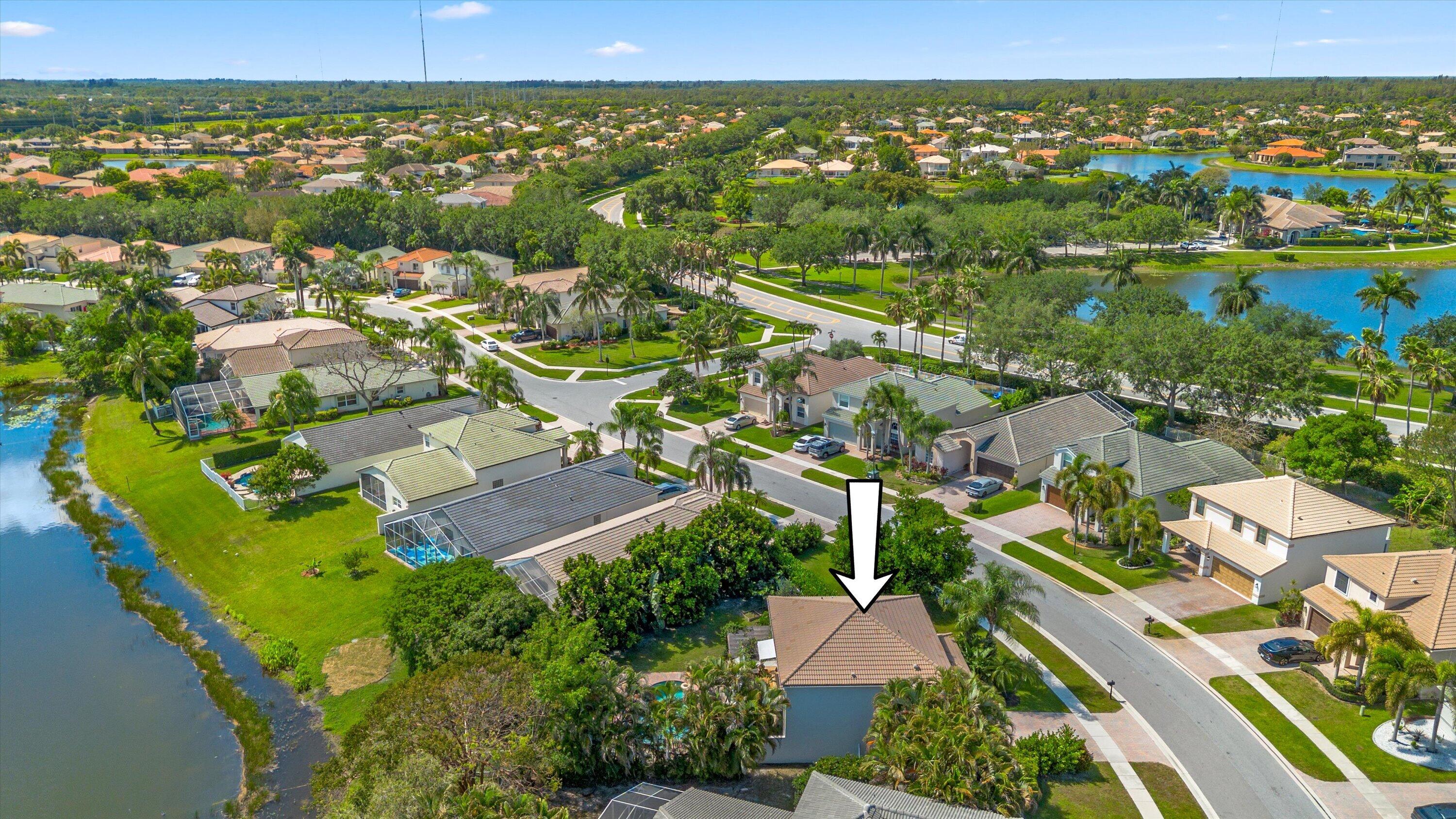 4138 Bluff Harbor Way Wellington, FL 33449 - Photo 44 of 48 an aerial view of residential houses with outdoor space