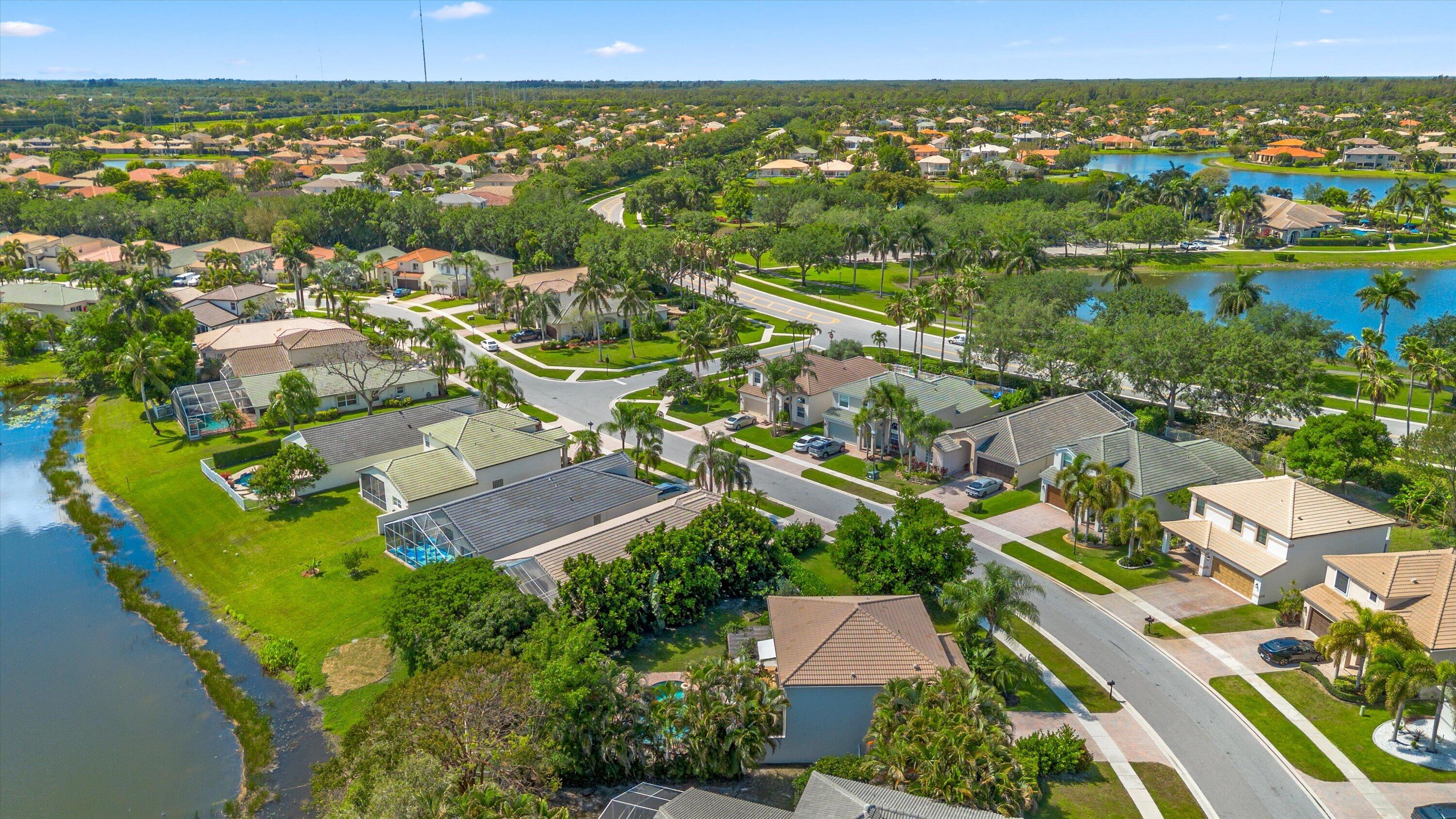 4138 Bluff Harbor Way Wellington, FL 33449 - Photo 45 of 48 an aerial view of residential houses with outdoor space