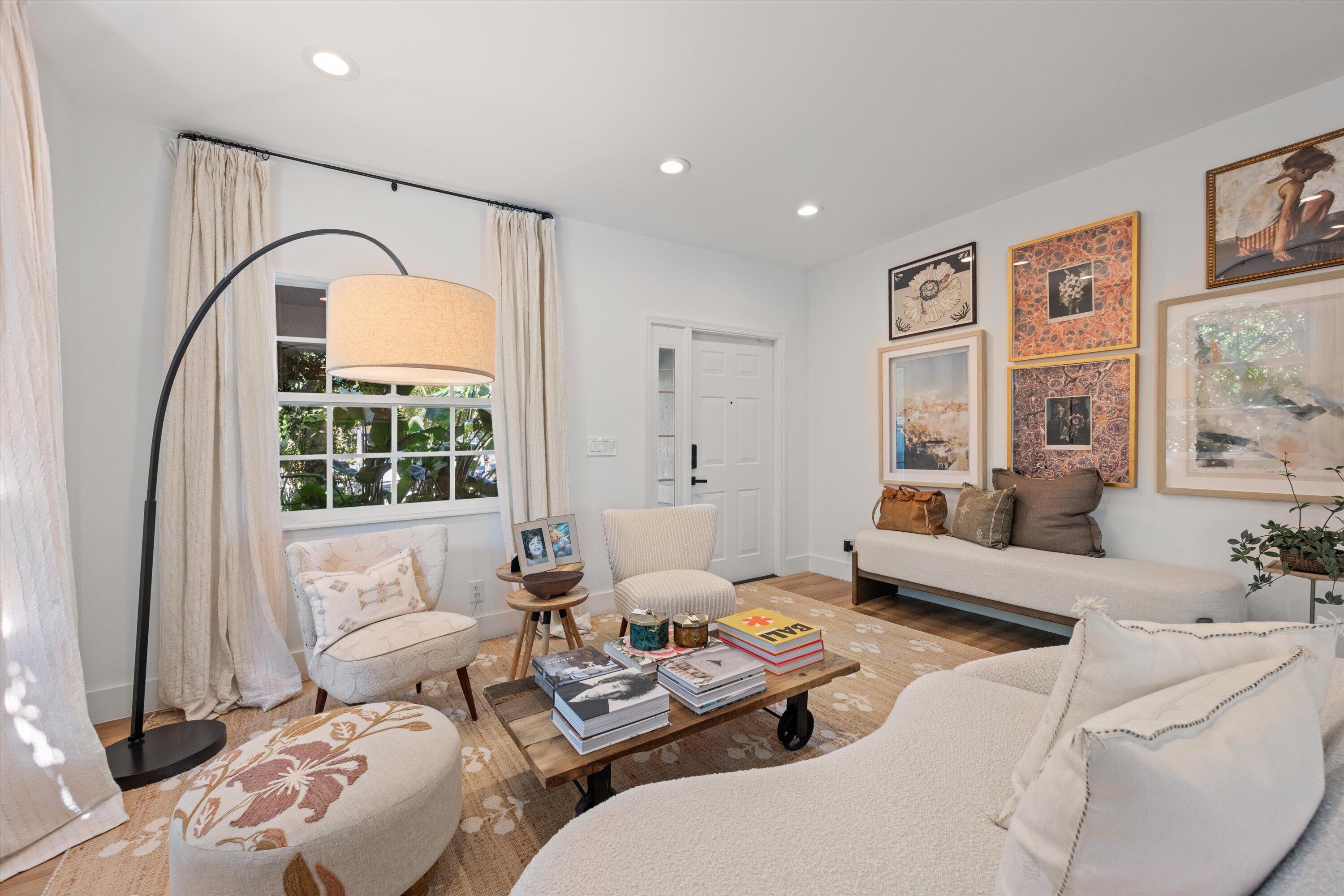 4138 Bluff Harbor Way Wellington, FL 33449 - Photo 6 of 48 a living room with furniture and a window