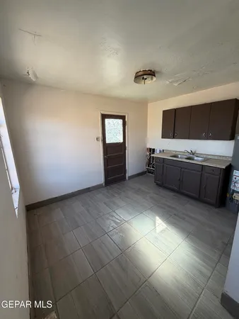 a bathroom with a bathtub shower sink and toilet