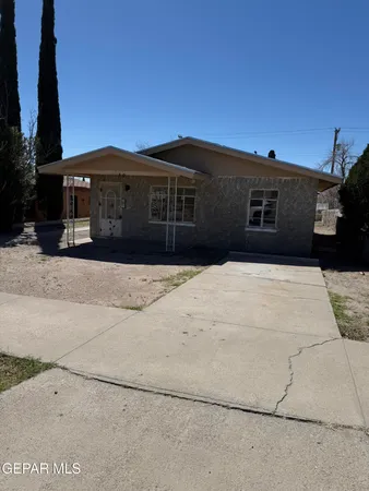a front view of house with a yard