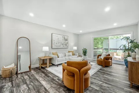 a living room with furniture or couch and a window