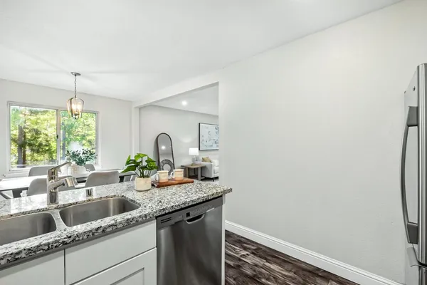 a kitchen with a sink and a window
