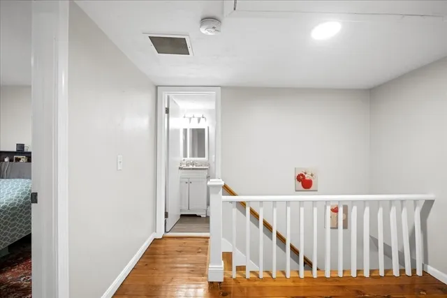 a view of entryway with wooden floor