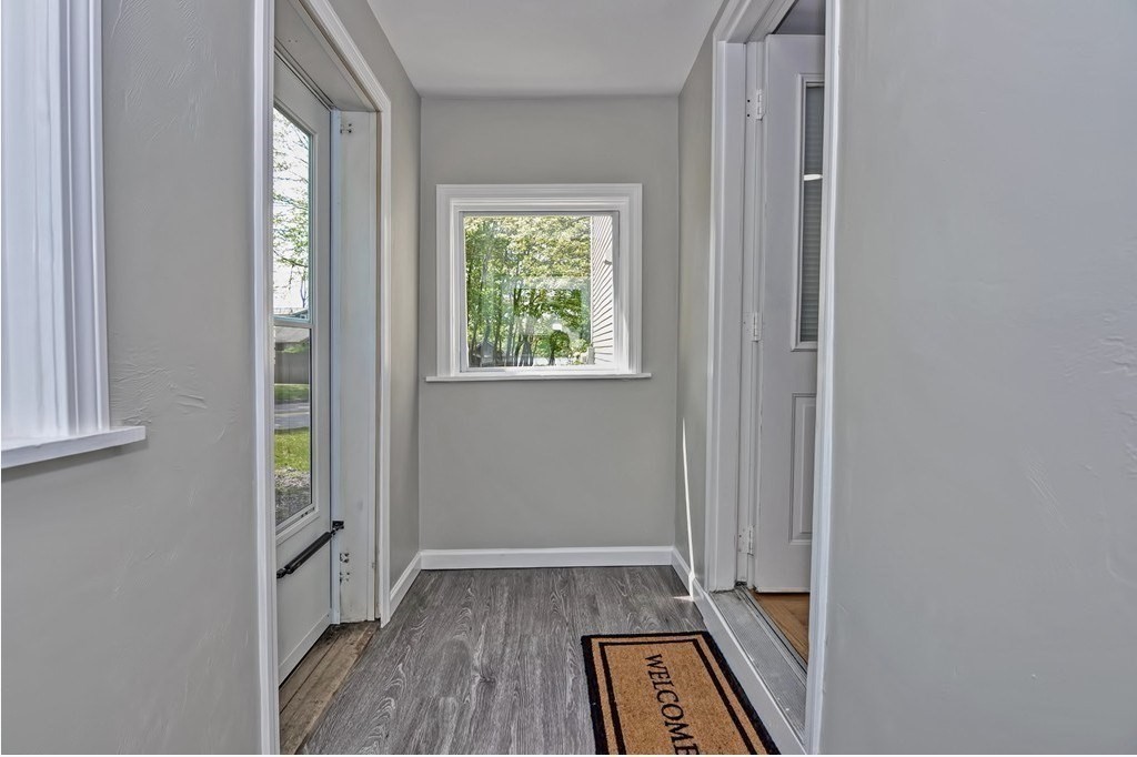65 Edgewater Avenue Shrewsbury, MA 01545 - Photo 27 of 35 wooden floor in an empty room with a window