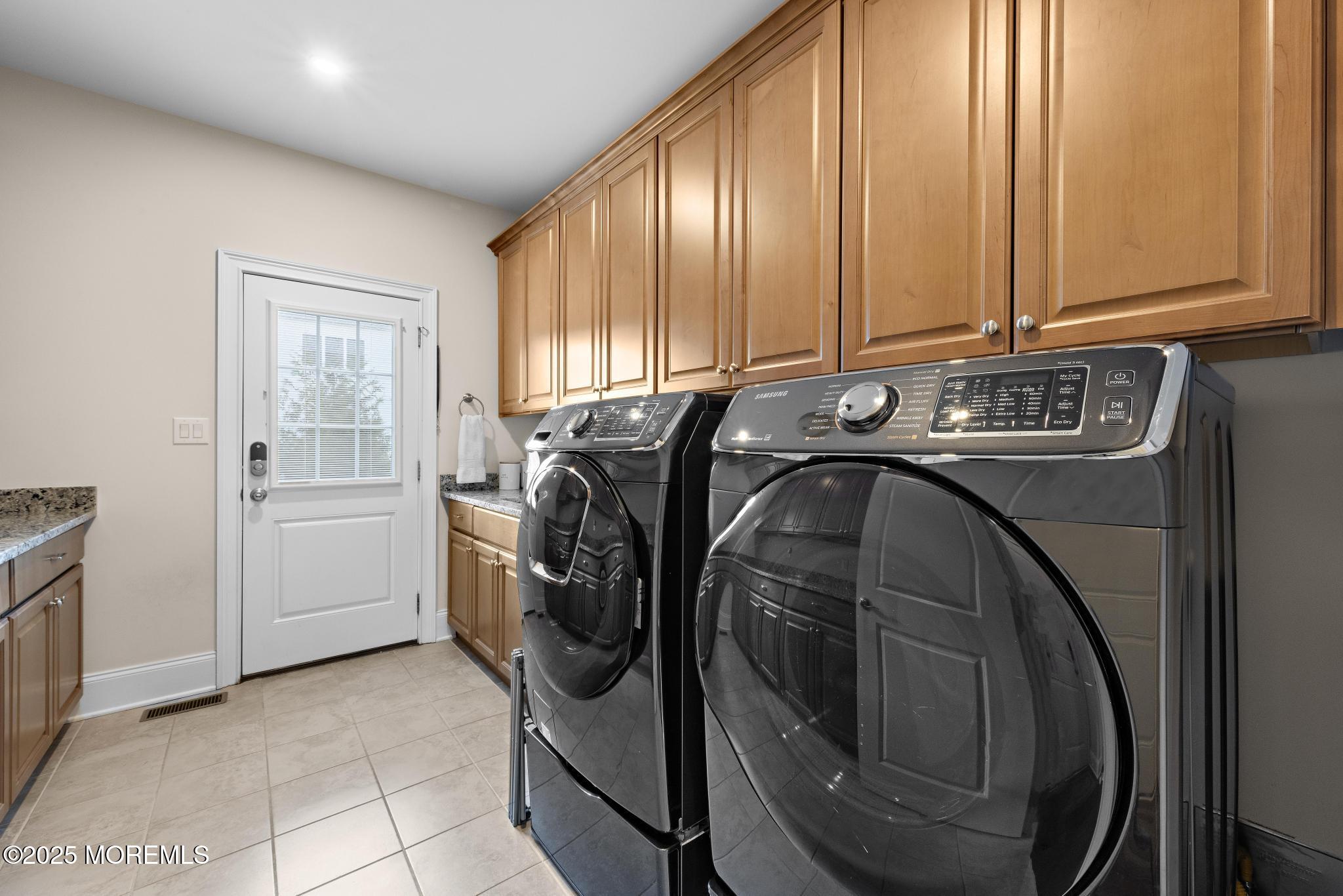 45 Windermere Road Lincroft, NJ 07738 - Photo 22 of 68 a utility room with dryer and washer