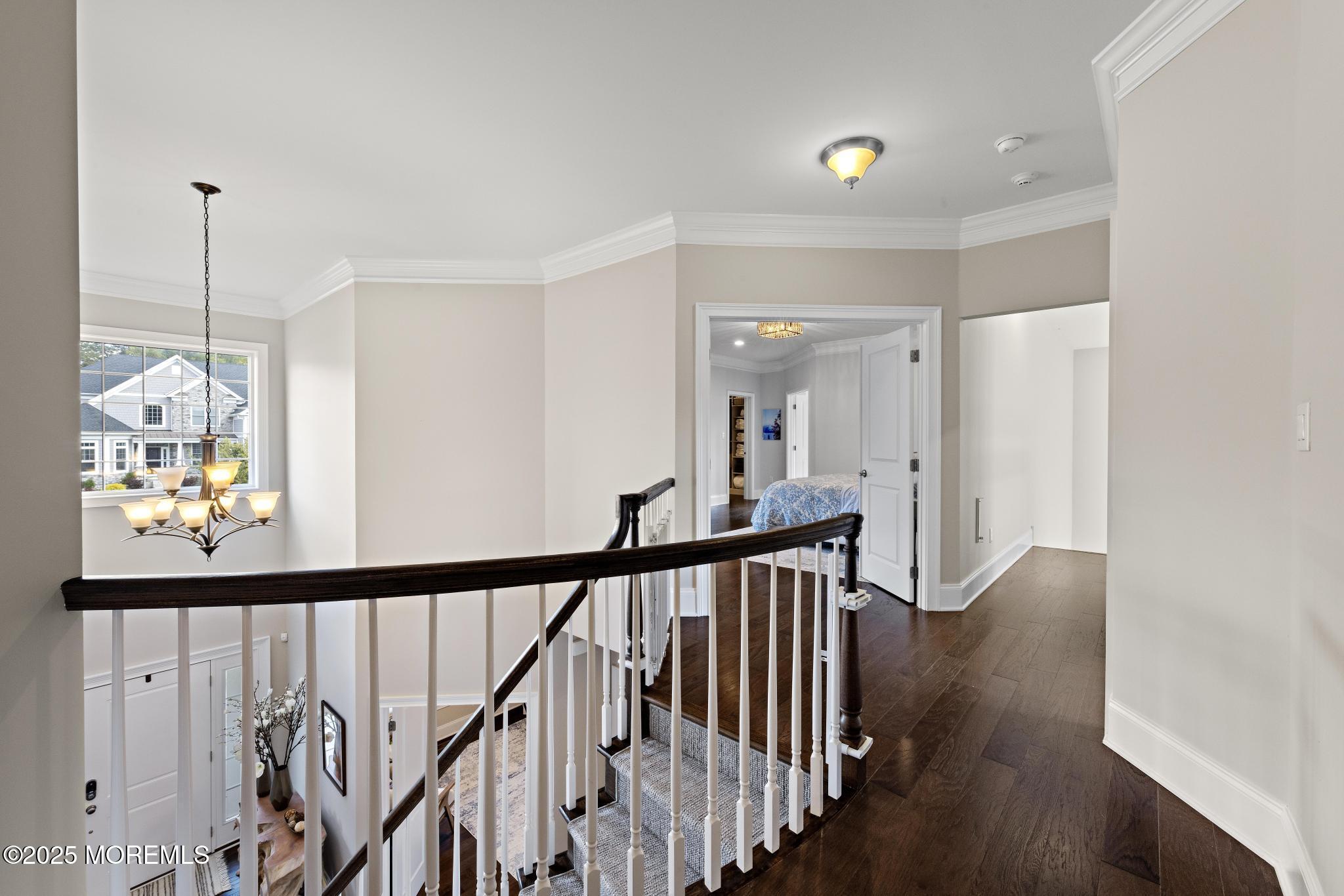 45 Windermere Road Lincroft, NJ 07738 - Photo 26 of 68 a view of a hallway with wooden floor and stairs