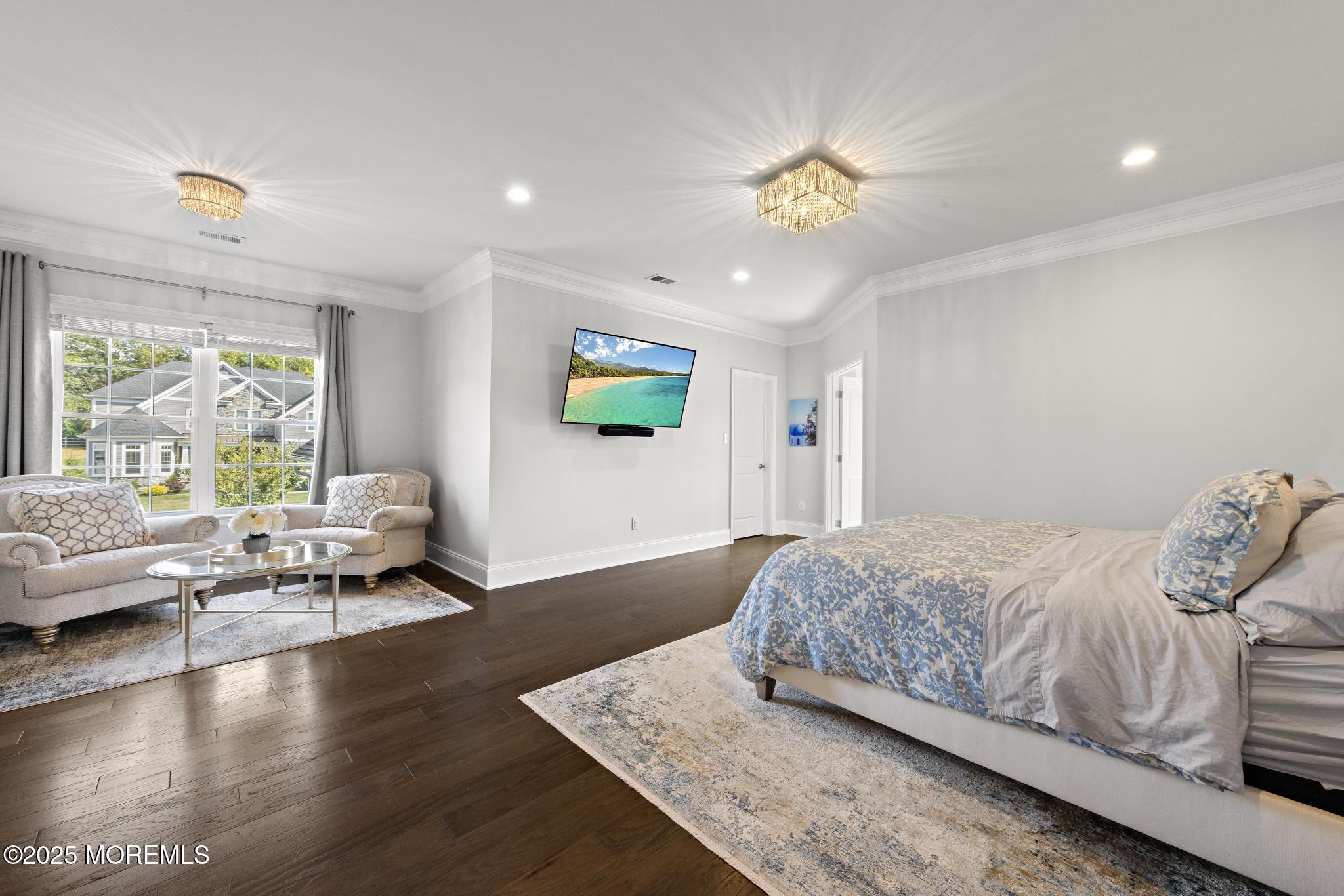 45 Windermere Road Lincroft, NJ 07738 - Photo 28 of 68 a spacious bedroom with a bed and a couch