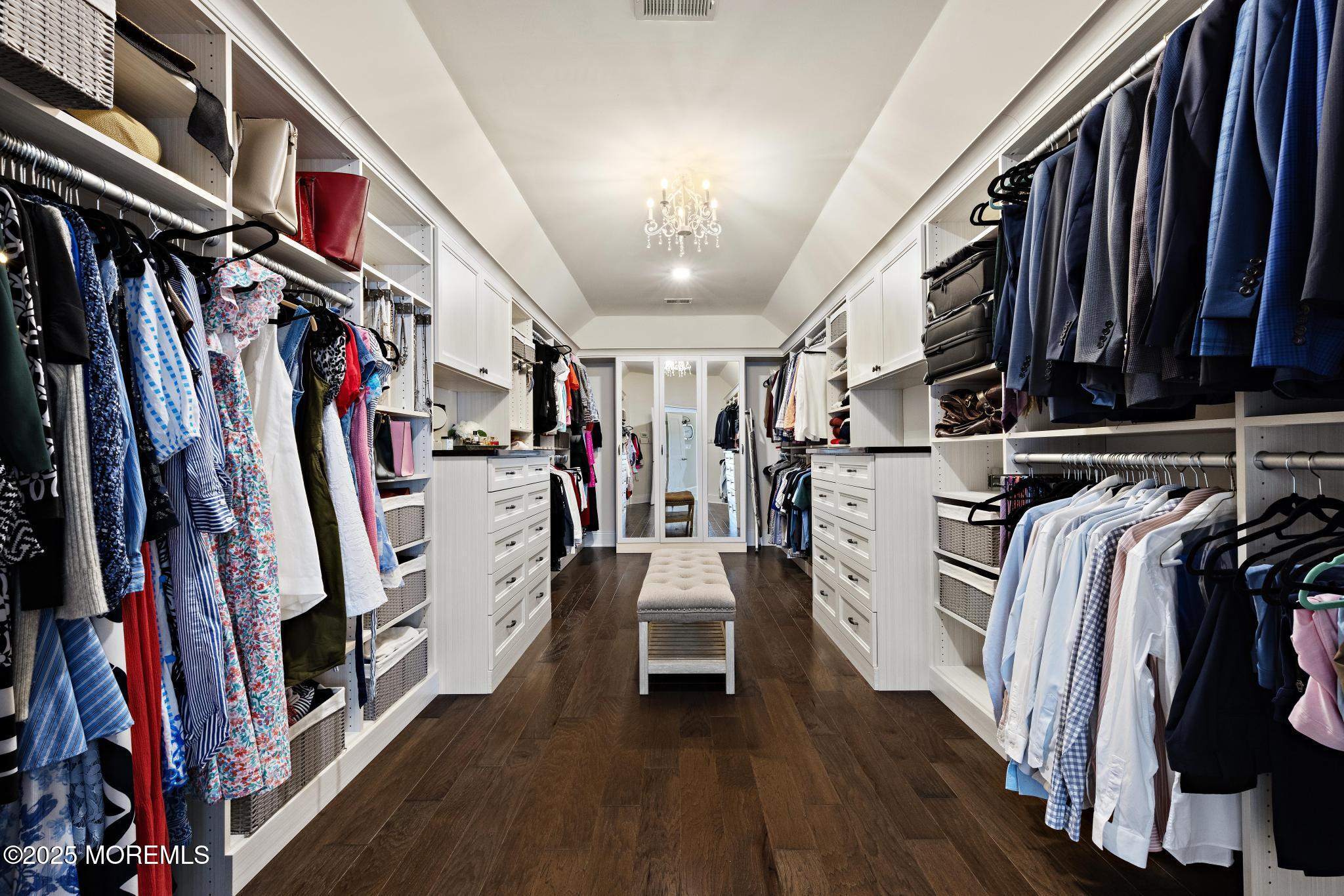 45 Windermere Road Lincroft, NJ 07738 - Photo 33 of 68 a view of walk in closet with clothes and shoes