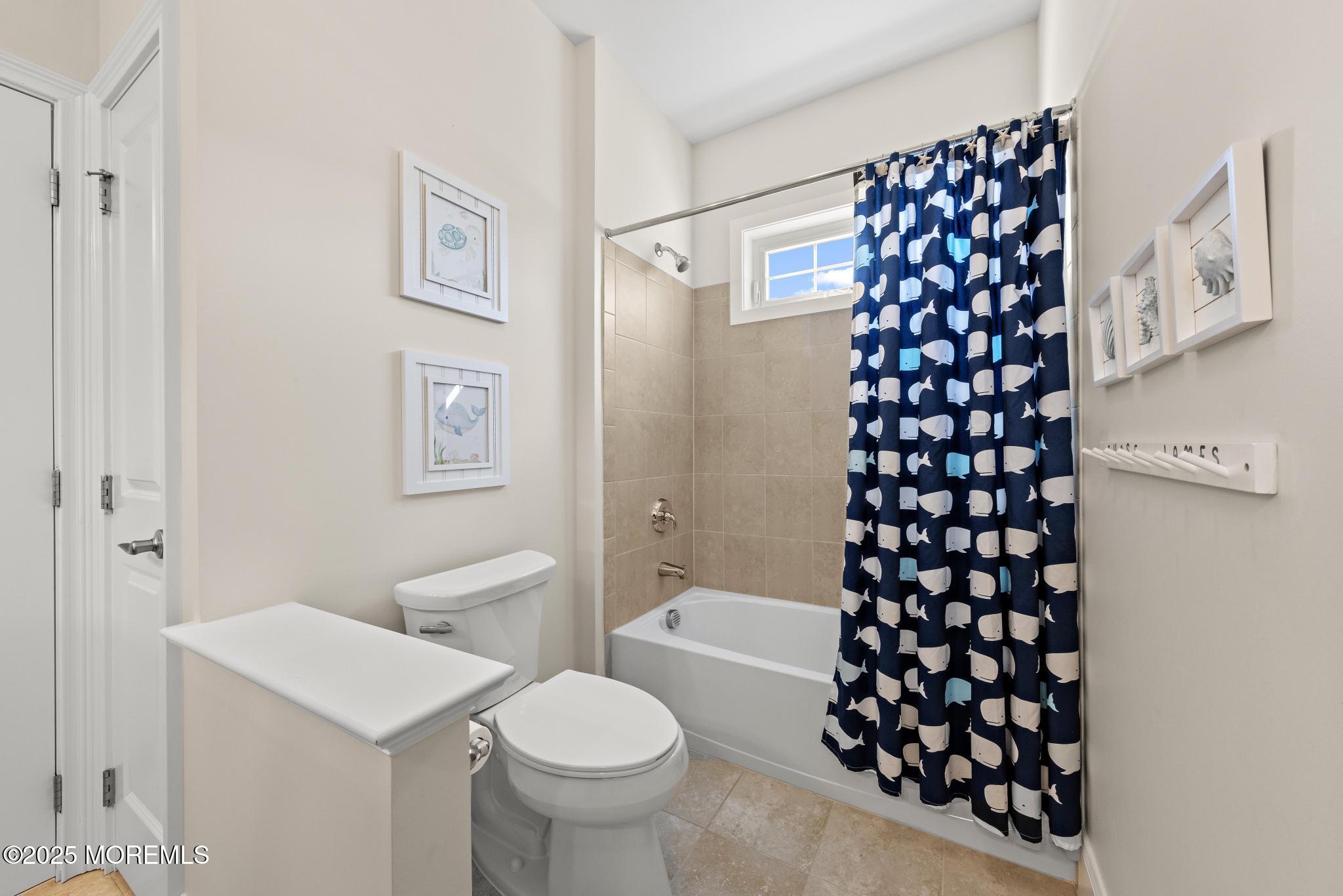 45 Windermere Road Lincroft, NJ 07738 - Photo 39 of 68 a bathroom with a toilet sink and shower