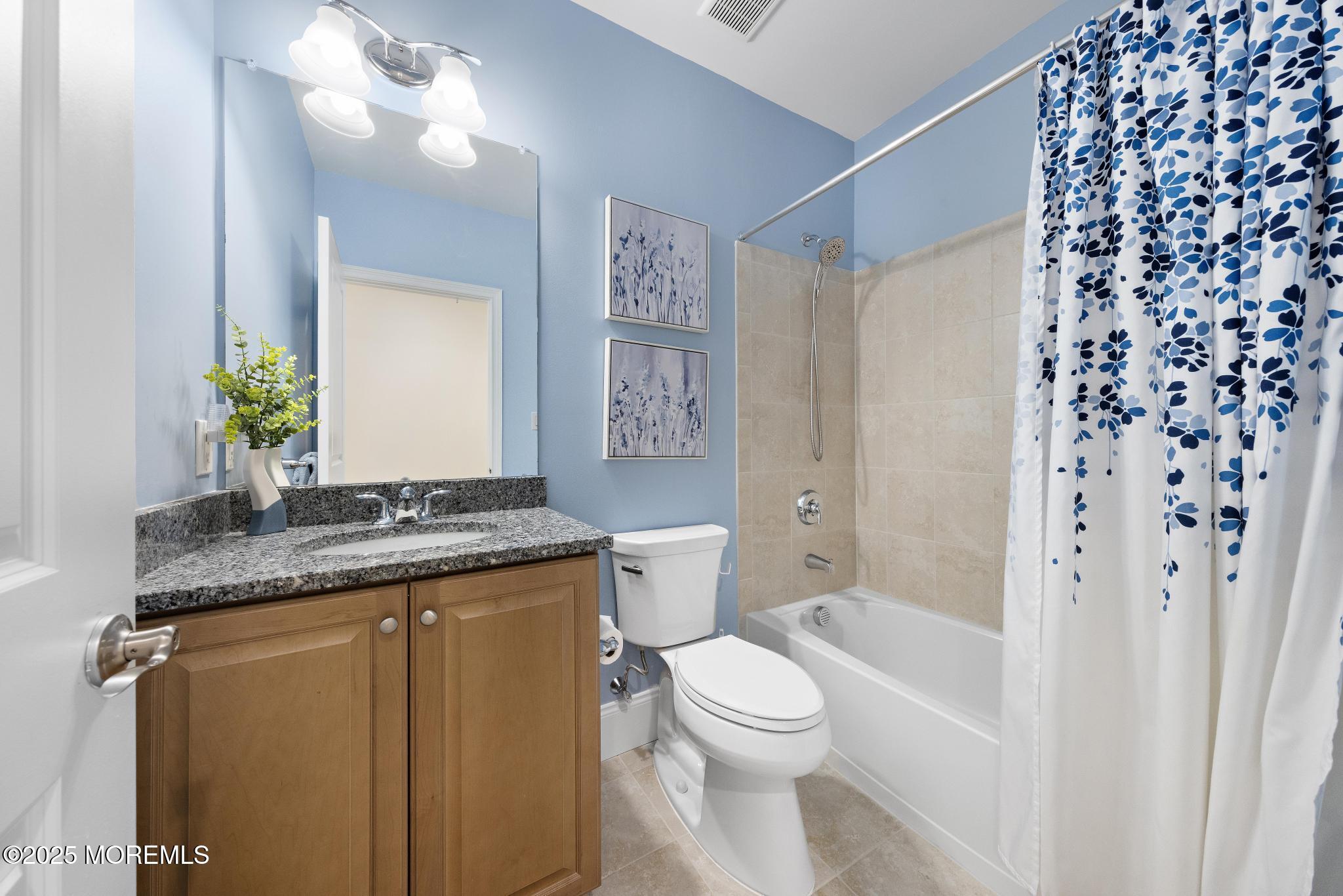 45 Windermere Road Lincroft, NJ 07738 - Photo 45 of 68 a bathroom with a granite countertop sink toilet and shower