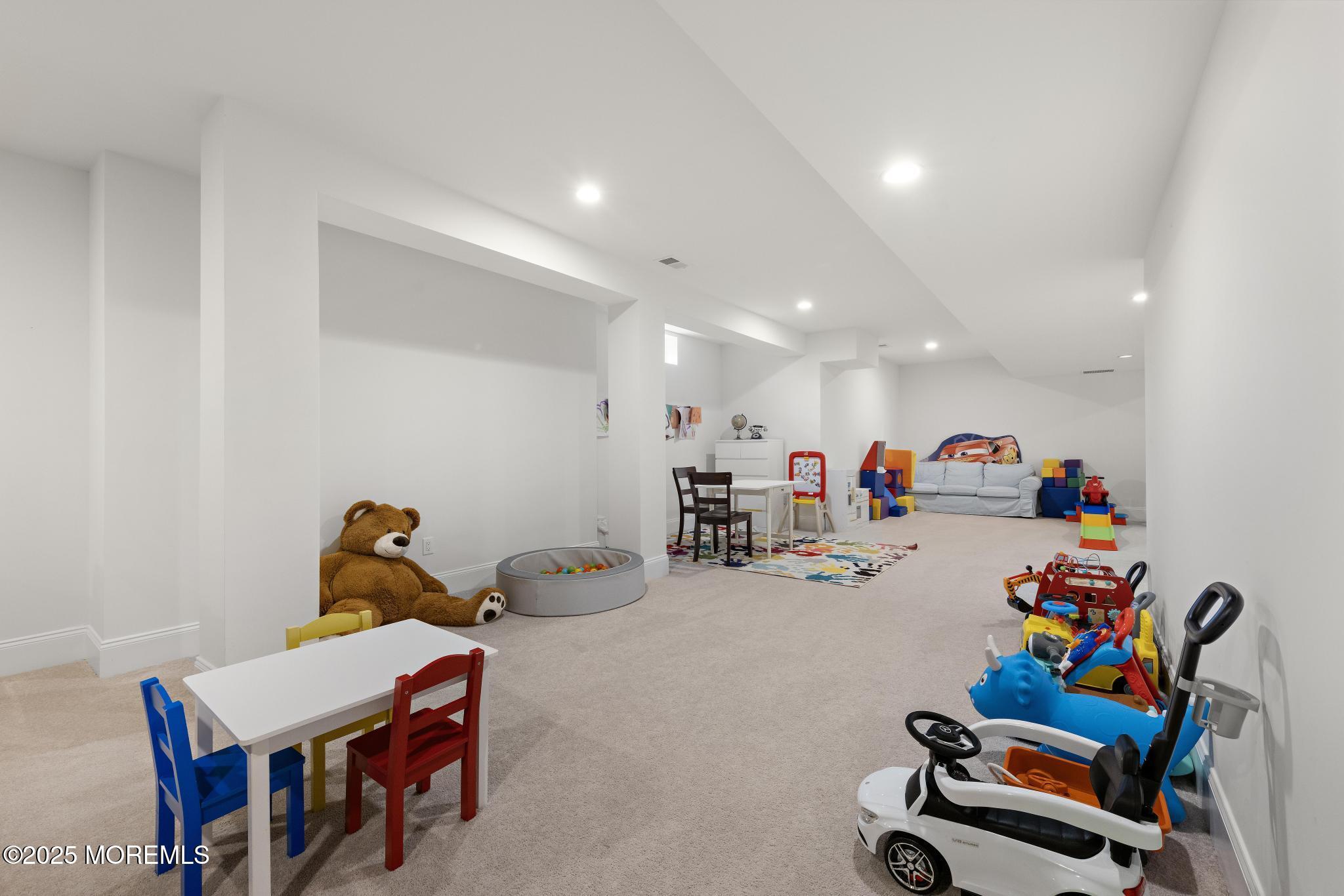 45 Windermere Road Lincroft, NJ 07738 - Photo 49 of 68 a room with furniture and a gym equipment