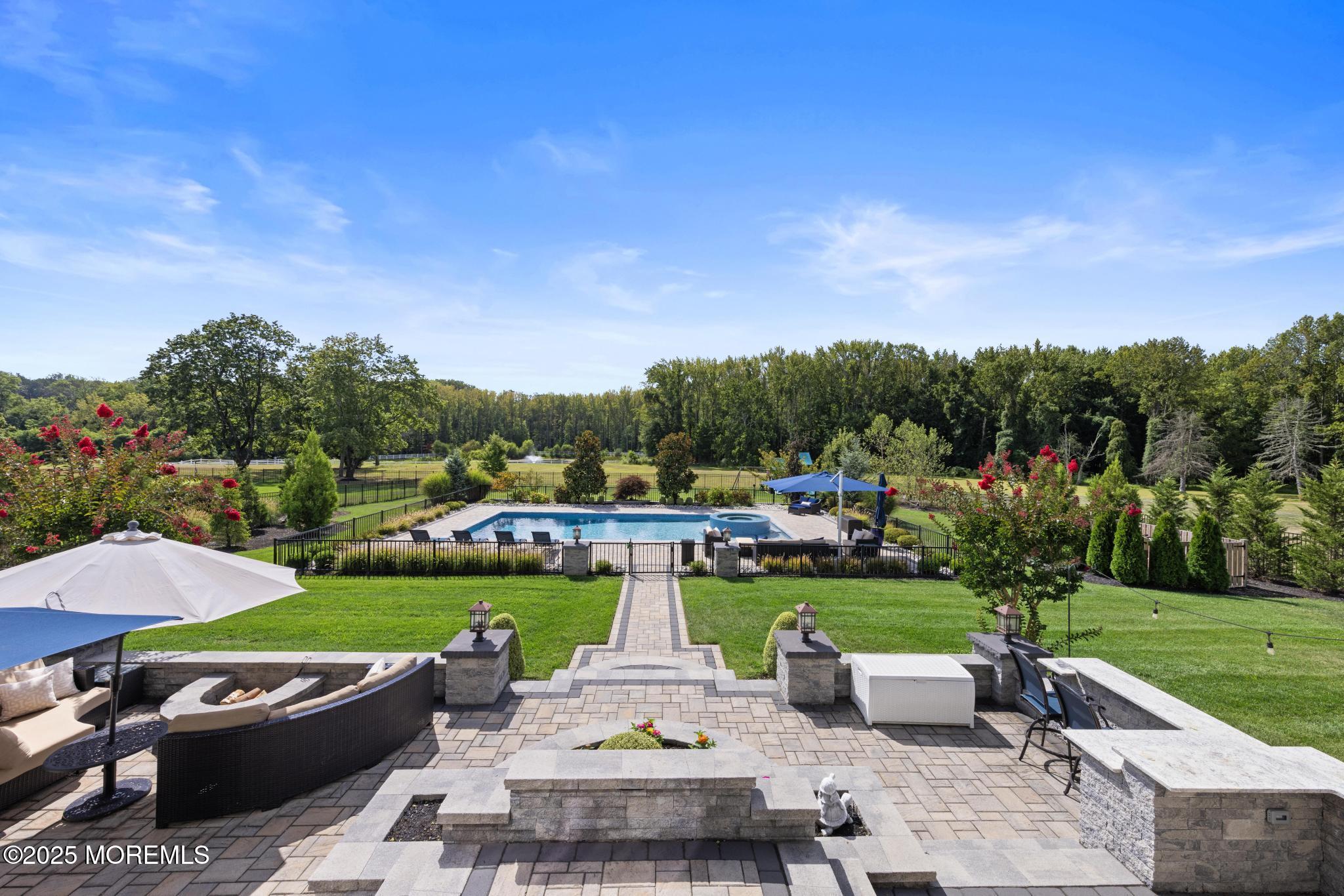 45 Windermere Road Lincroft, NJ 07738 - Photo 53 of 68 a view of yard with outdoor seating and green space