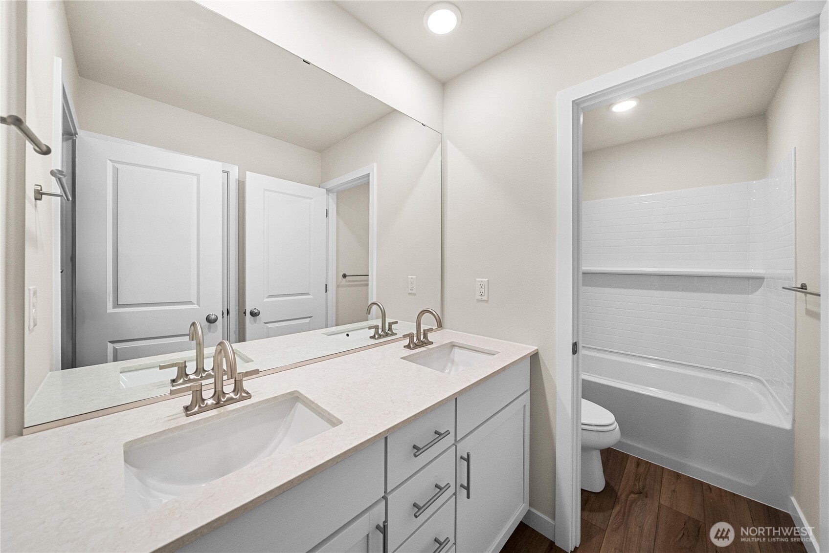 5904 Trce Drive Southwest Port Orchard, WA 98367 - Photo 27 of 29 a bathroom with a sink vanity granite tub and a mirror