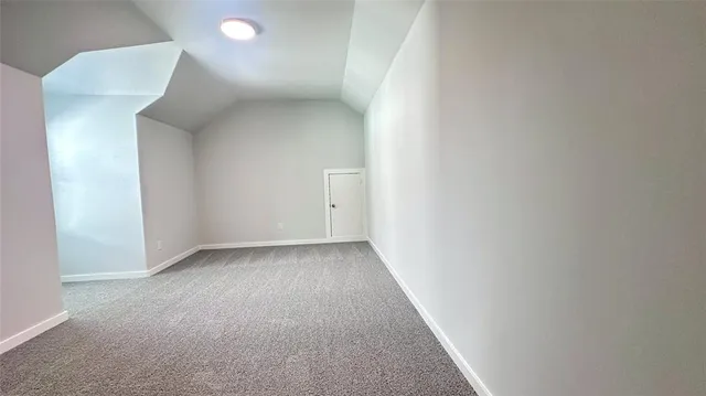 a view of a room with an empty space