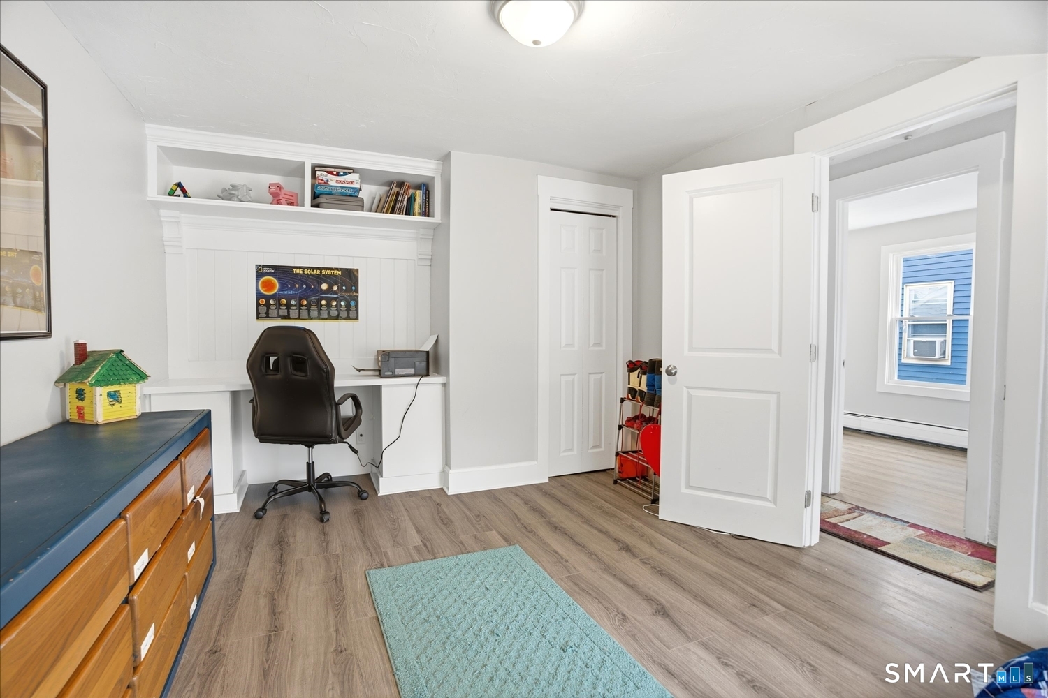 67 Pomfret Street Putnam, CT 06260 - Photo 14 of 25 a workspace with furniture wooden floor and a window