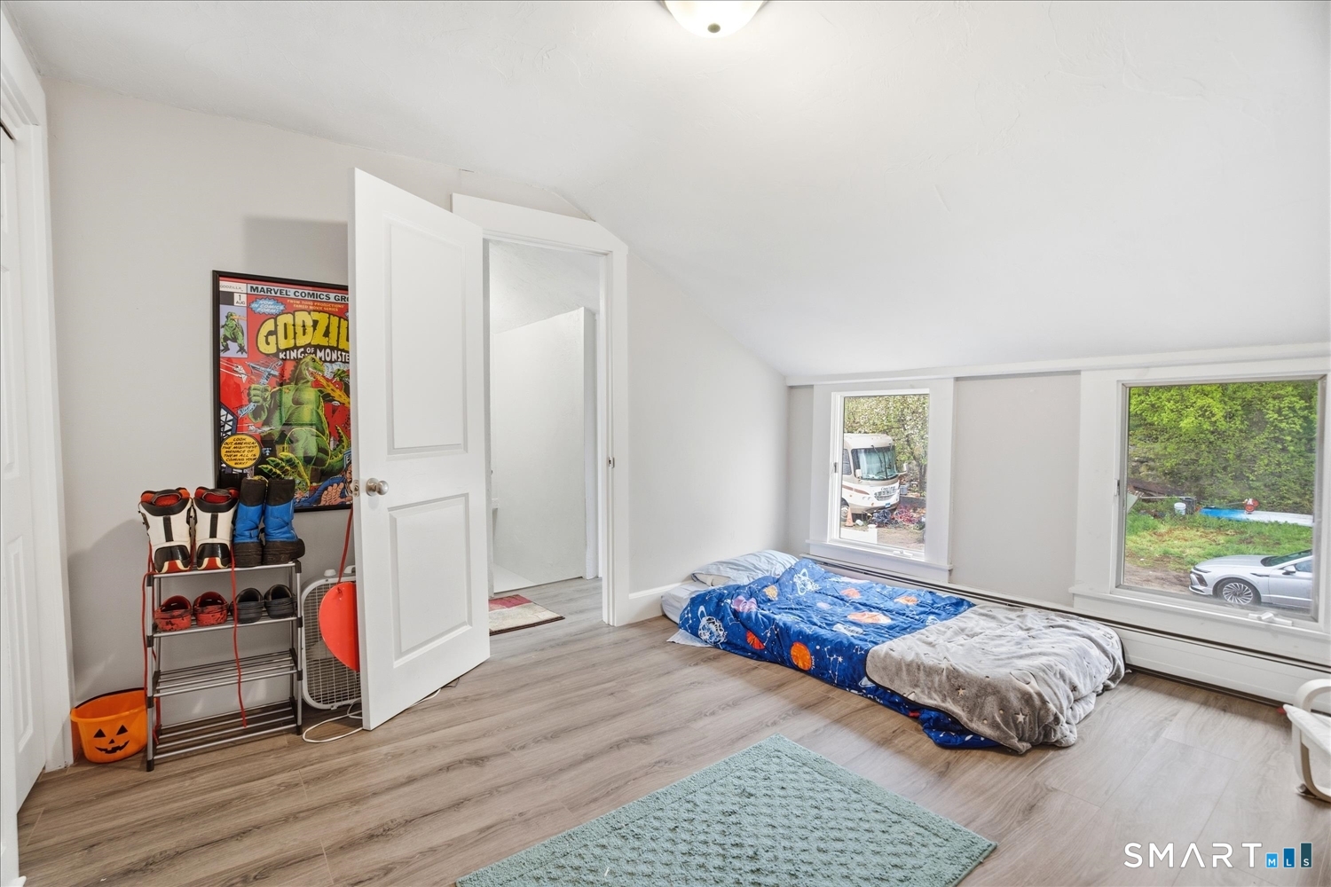 67 Pomfret Street Putnam, CT 06260 - Photo 15 of 25 a bedroom with a bed and a window