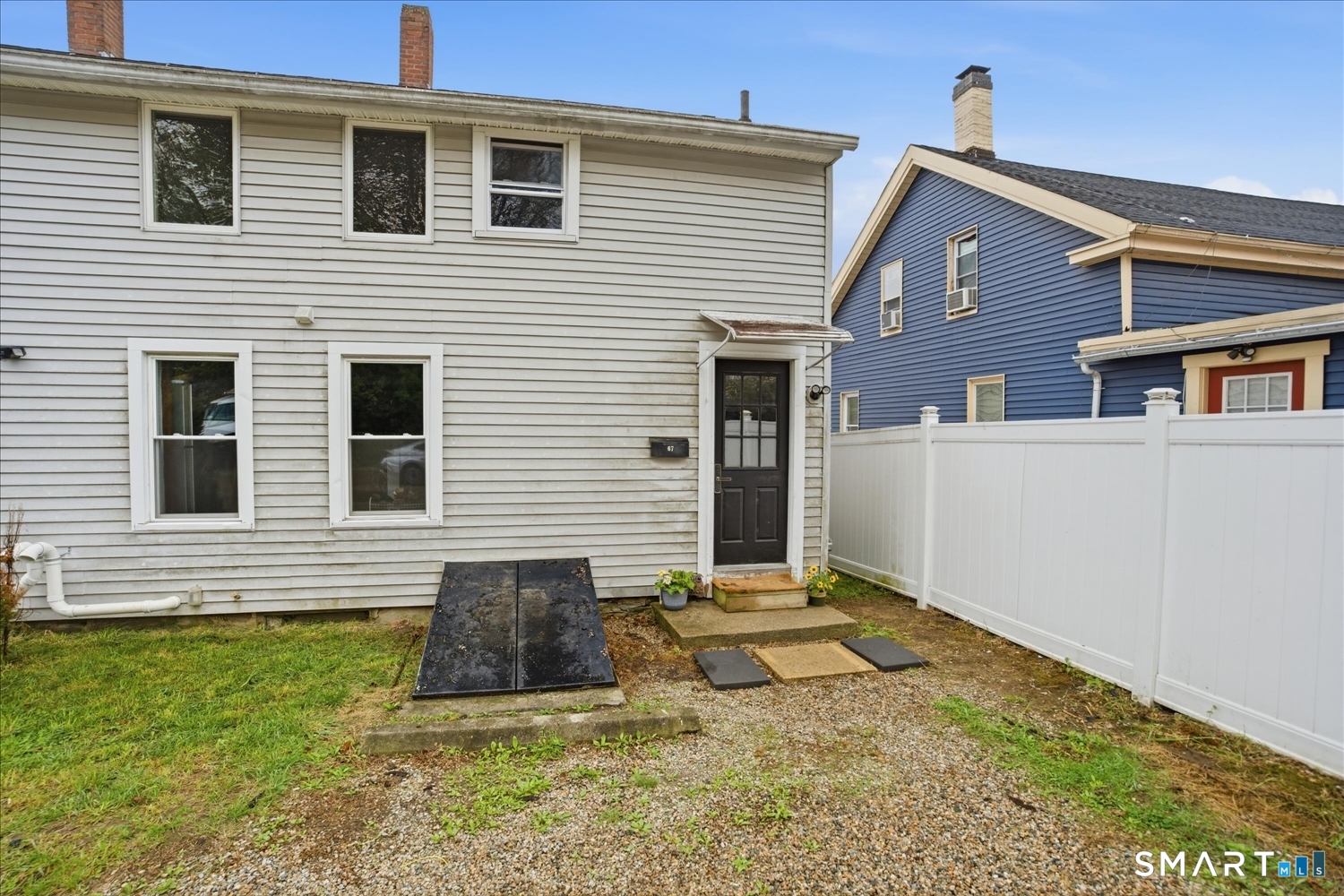 67 Pomfret Street Putnam, CT 06260 - Photo 25 of 25 a view of a house with a yard