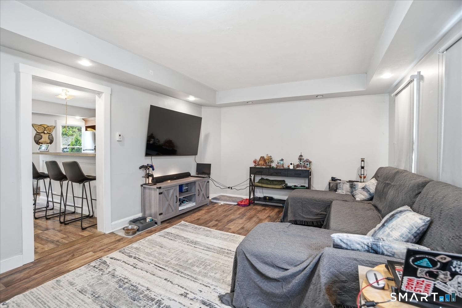 67 Pomfret Street Putnam, CT 06260 - Photo 6 of 25 a living room with furniture and a flat screen tv