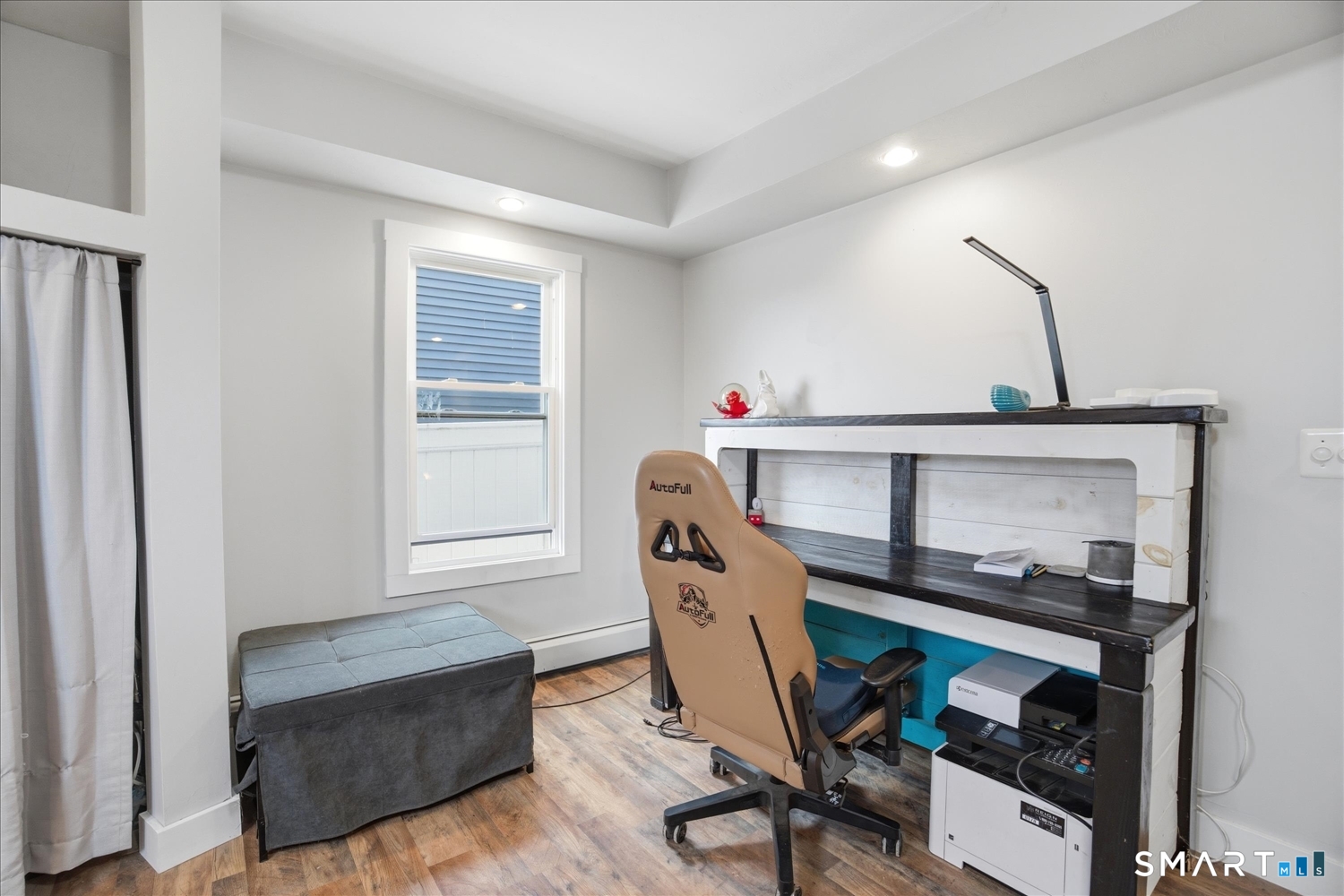 67 Pomfret Street Putnam, CT 06260 - Photo 8 of 25 a workspace with furniture and a window