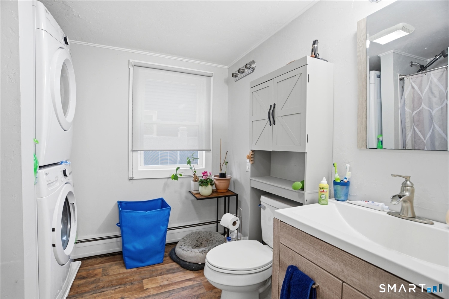 67 Pomfret Street Putnam, CT 06260 - Photo 9 of 25 a bathroom with a sink toilet vanity and tub