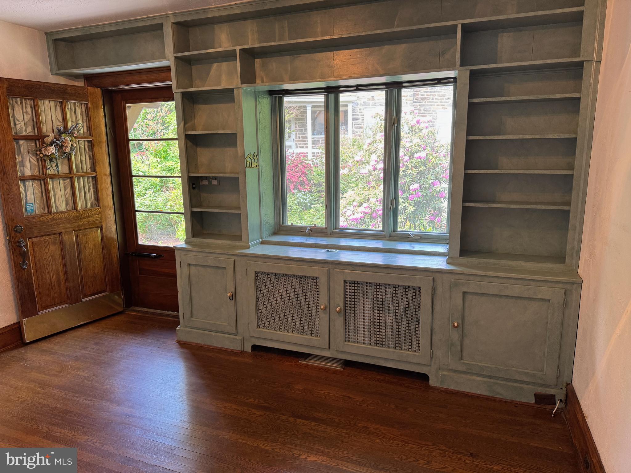 1217 Medford Road Wynnewood, PA 19096 - Photo 35 of 92 Den Built-ins & Door to Driveway