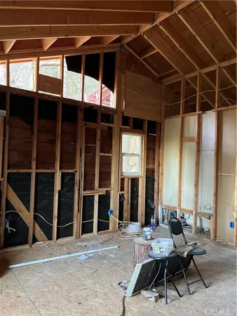 a view of a backyard of the house