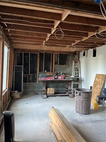 a view of a chairs and table in a patio