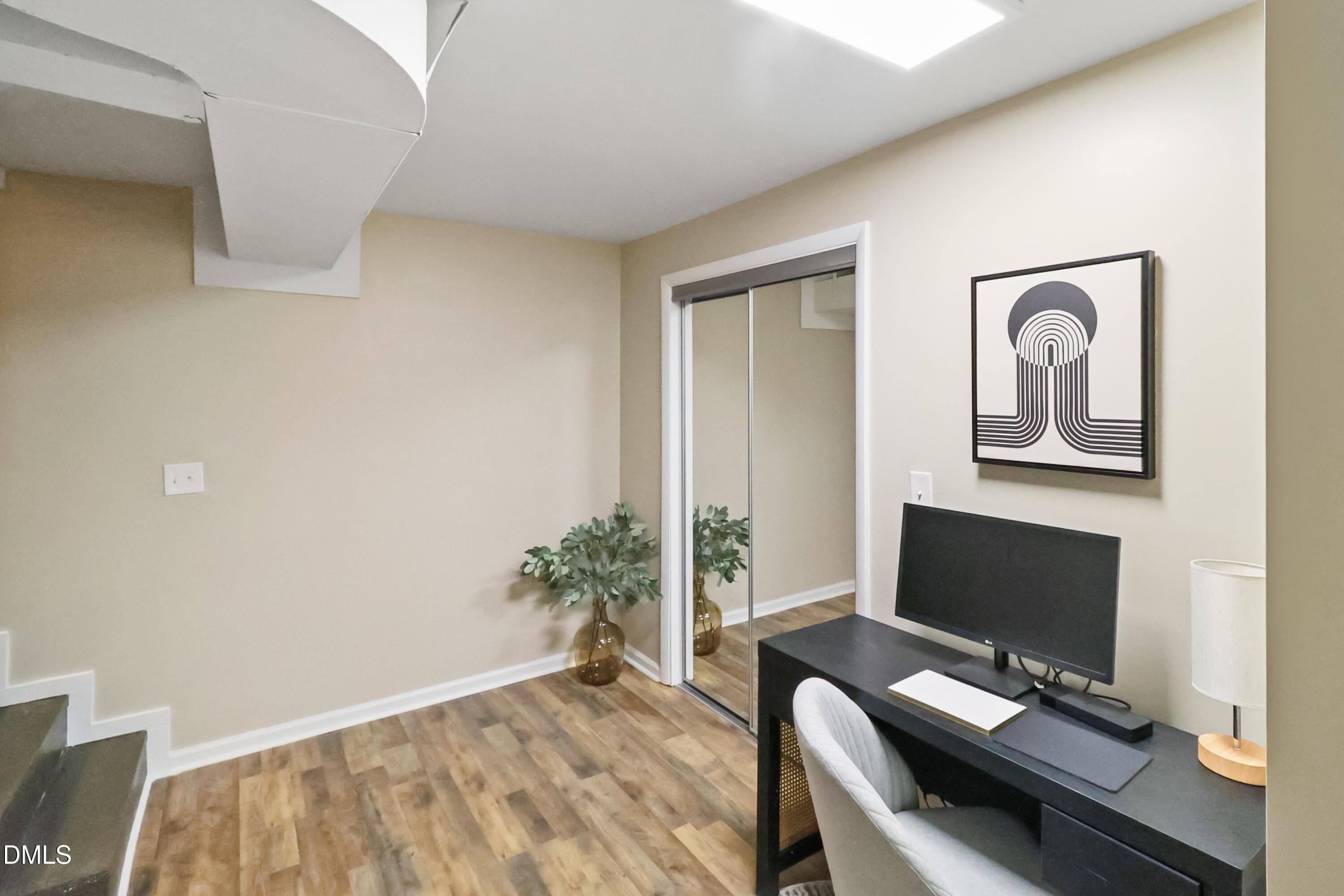 115 Bertie Drive Raleigh, NC 27610 - Photo 16 of 27 a view of a workspace with furniture and a window