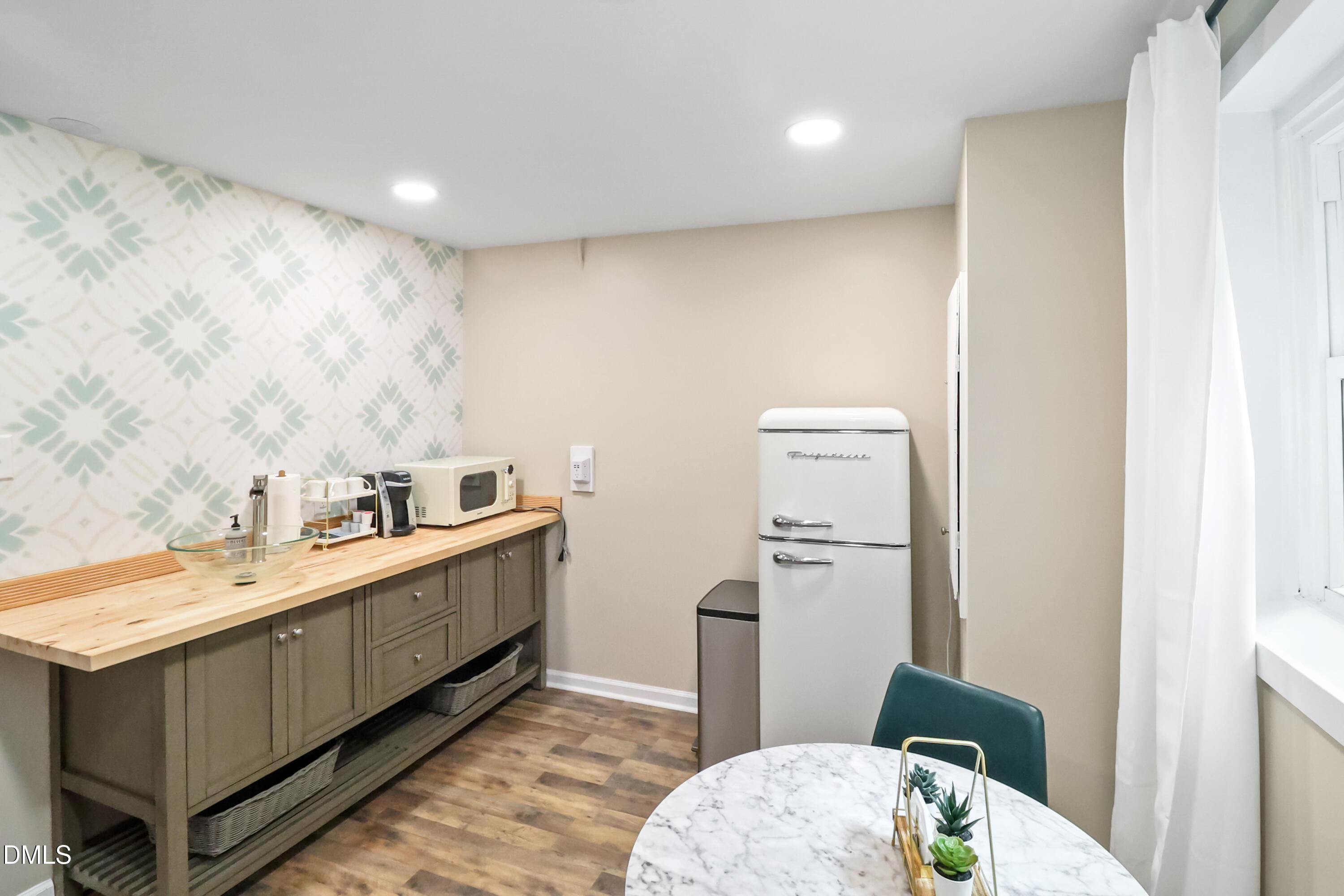 115 Bertie Drive Raleigh, NC 27610 - Photo 17 of 27 a bathroom with a sink a toilet and vanity