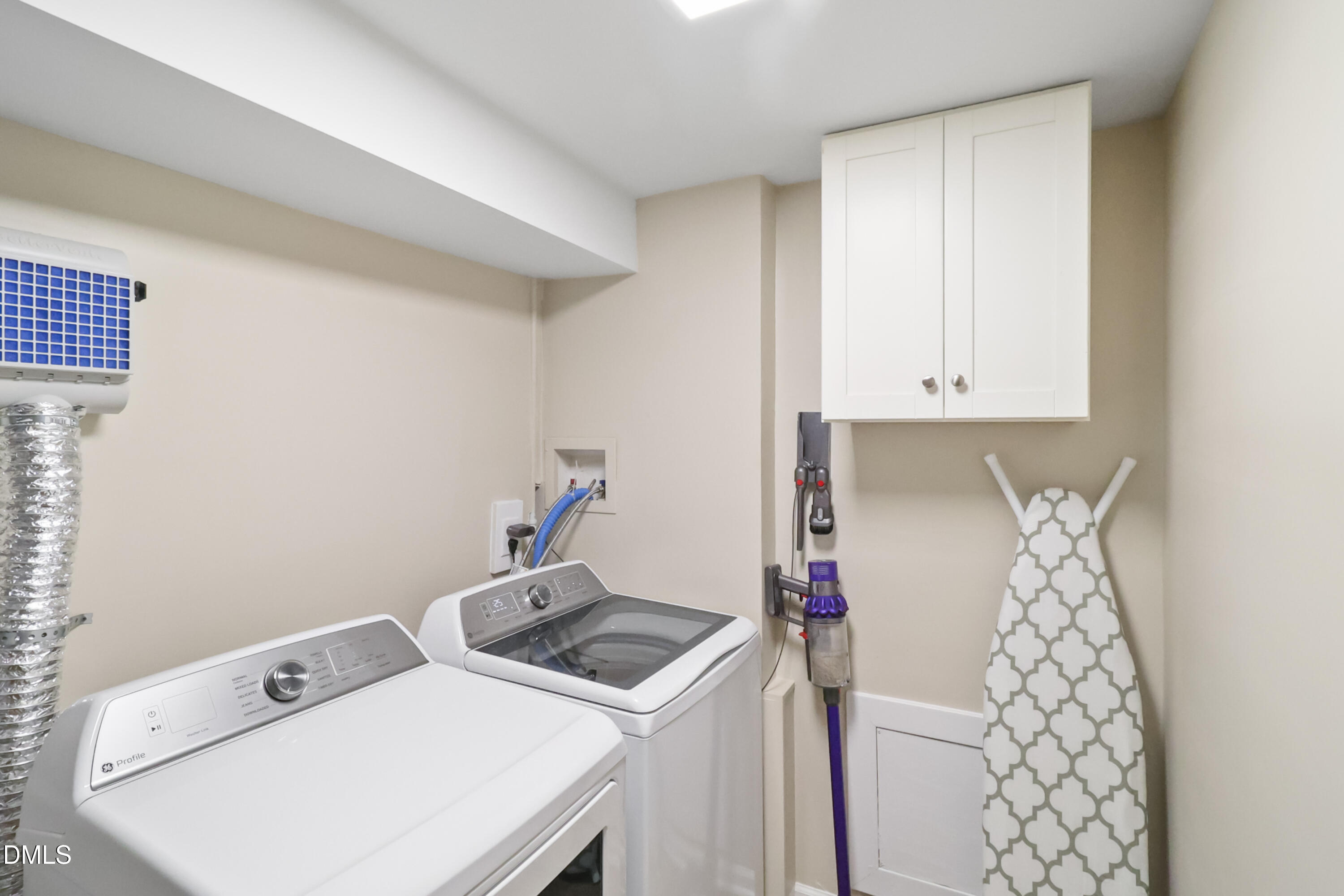 115 Bertie Drive Raleigh, NC 27610 - Photo 21 of 27 a utility room with dryer and washer