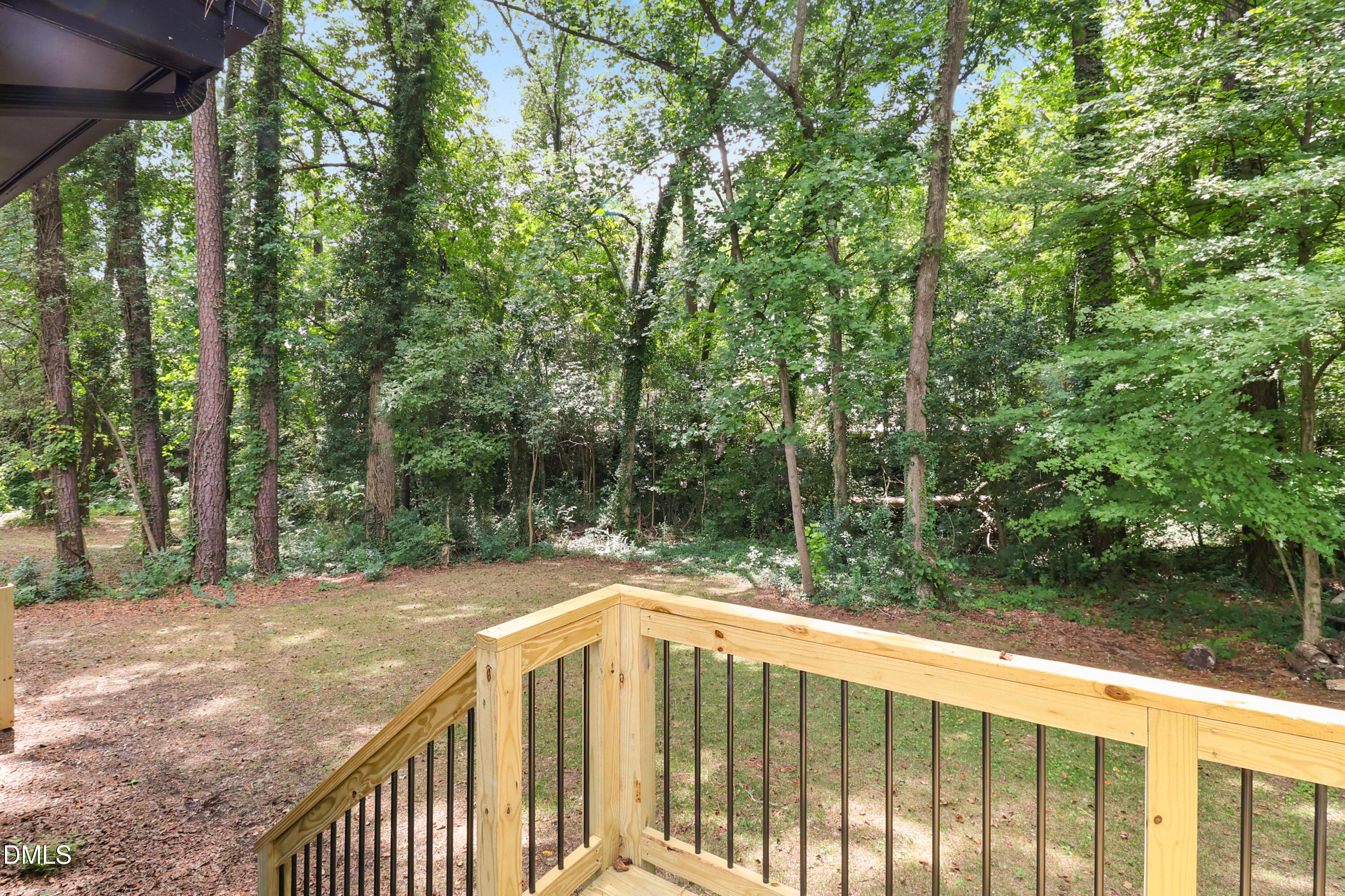 115 Bertie Drive Raleigh, NC 27610 - Photo 22 of 27 a view of a balcony with yard