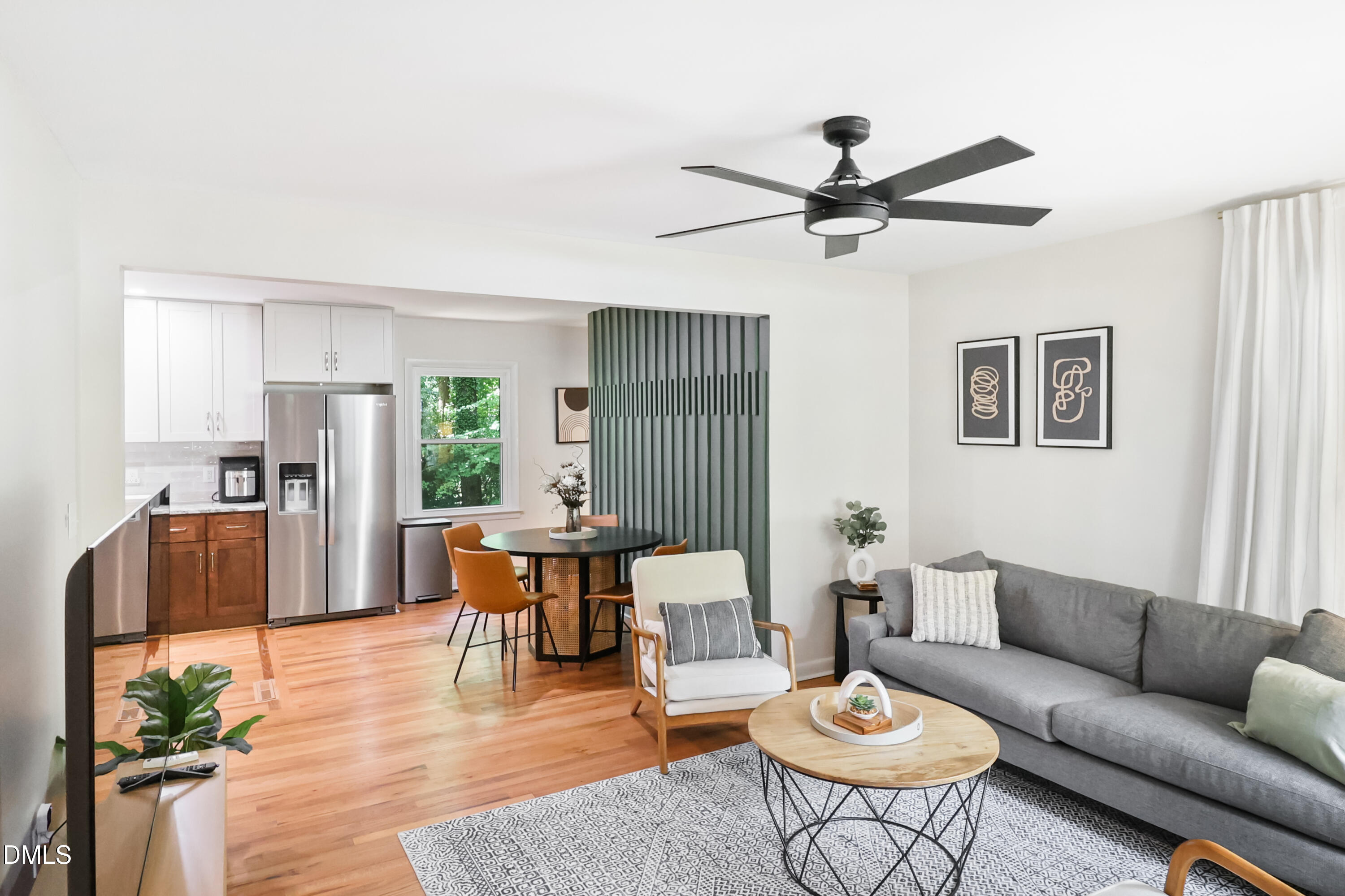 115 Bertie Drive Raleigh, NC 27610 - Photo 4 of 27 a living room with furniture and a wooden floor