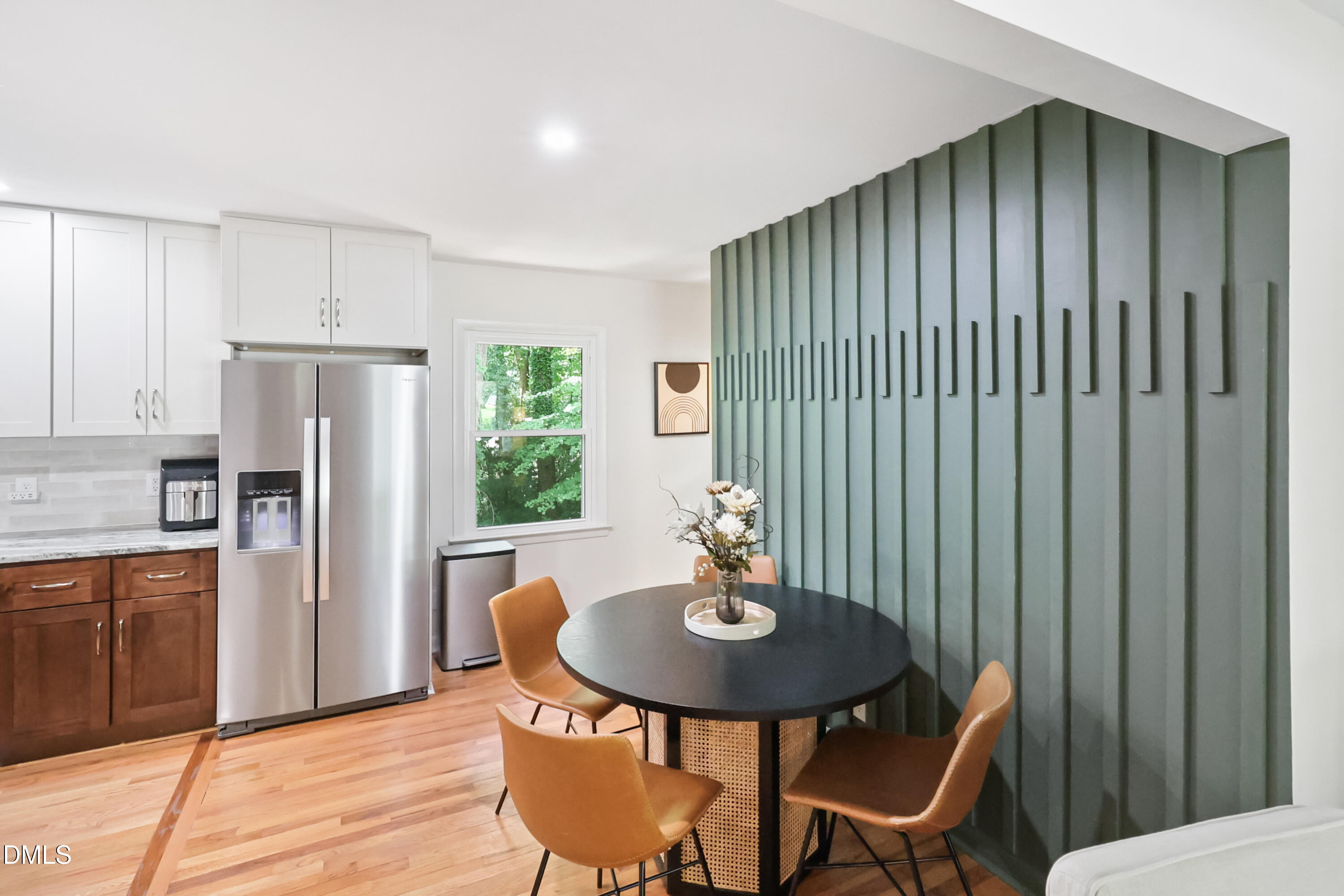 115 Bertie Drive Raleigh, NC 27610 - Photo 6 of 27 a view of a dining room with furniture window and wooden floor