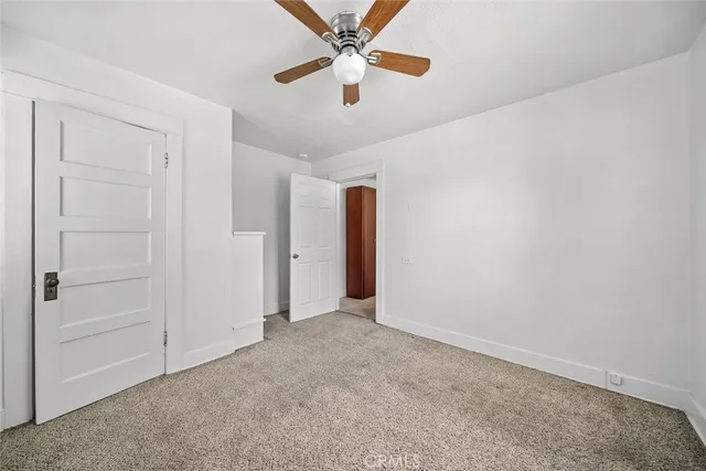 a house with trees in the background