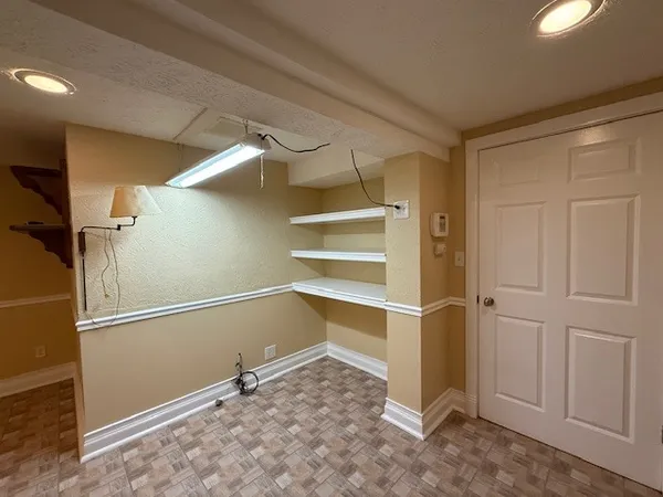 a view of a livingroom with a staircase
