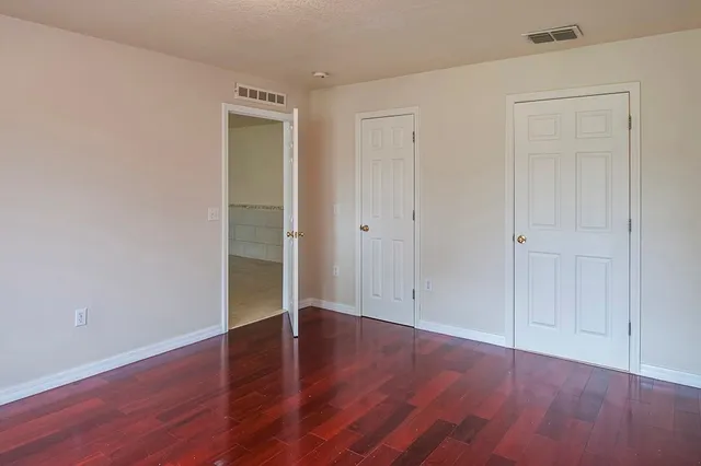 a view of a room with racks on the wall
