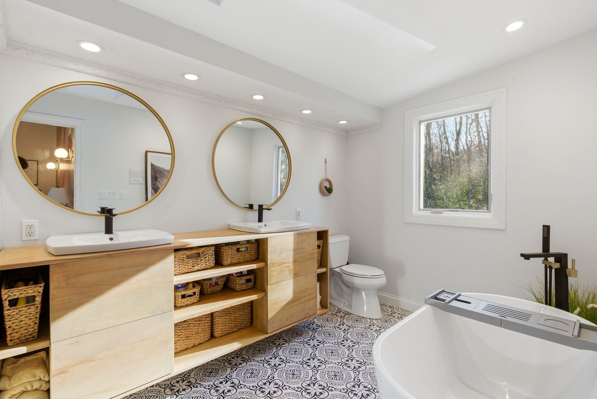 1507 St Augustine Road Erin, WI 53033 - Photo 14 of 25 Custom made floating vanity, dual sinks and a soaking tub