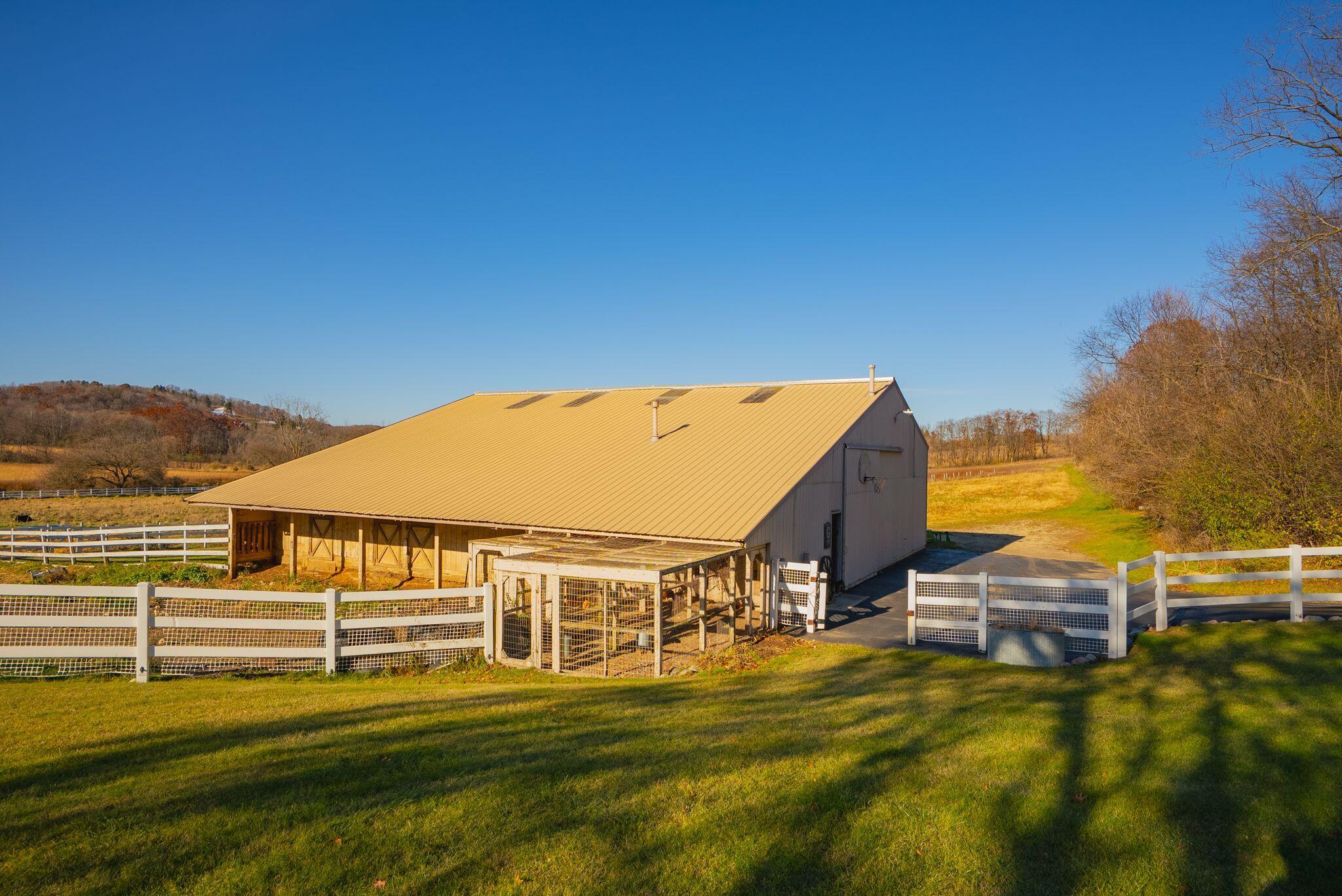 1507 St Augustine Road Erin, WI 53033 - Photo 21 of 25 60x60 barn with indoor chicken coop, 3.5 stalls and a 25x14 tack room