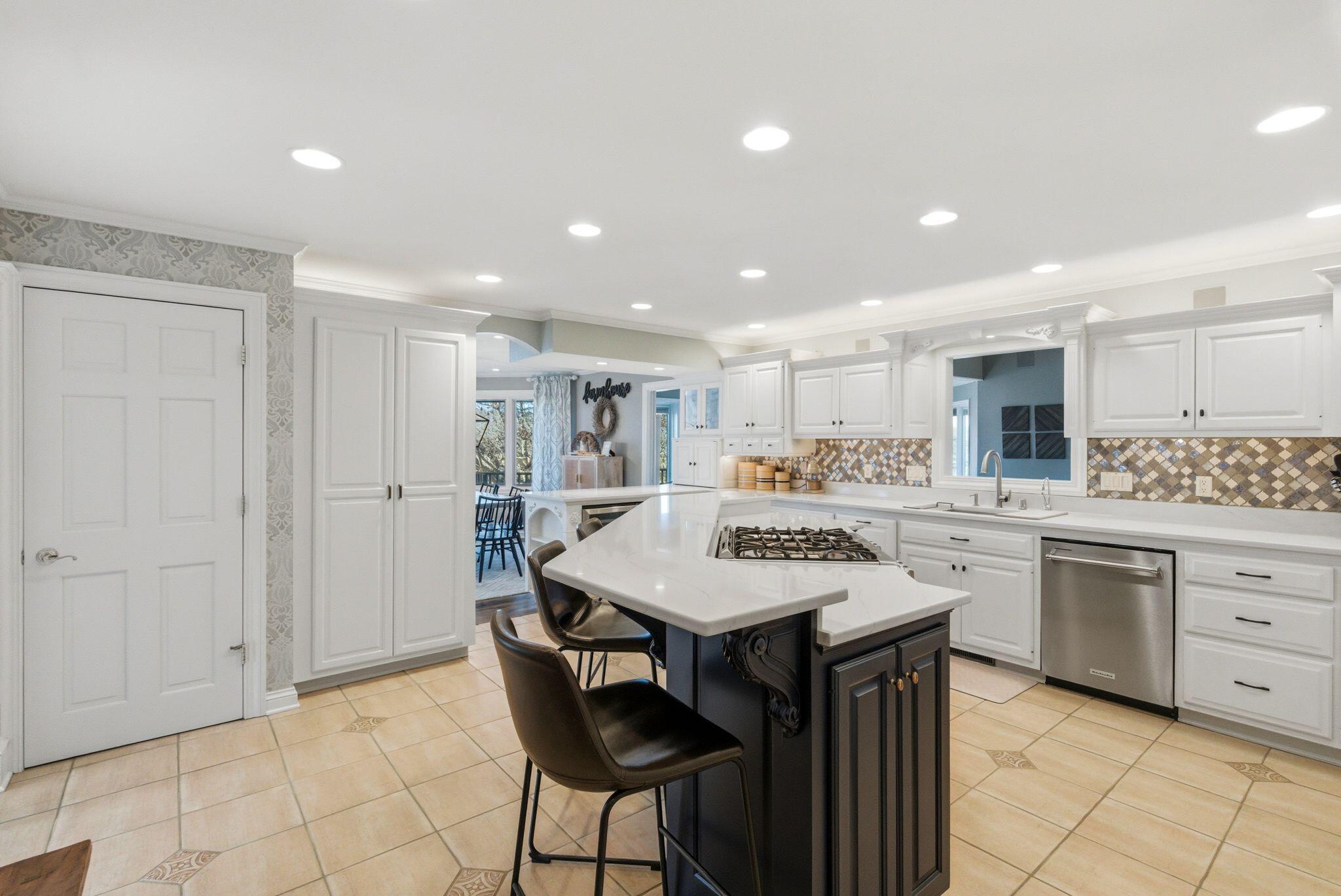 1507 St Augustine Road Erin, WI 53033 - Photo 8 of 25 Built-in split gas oven/range in multi-tiered island