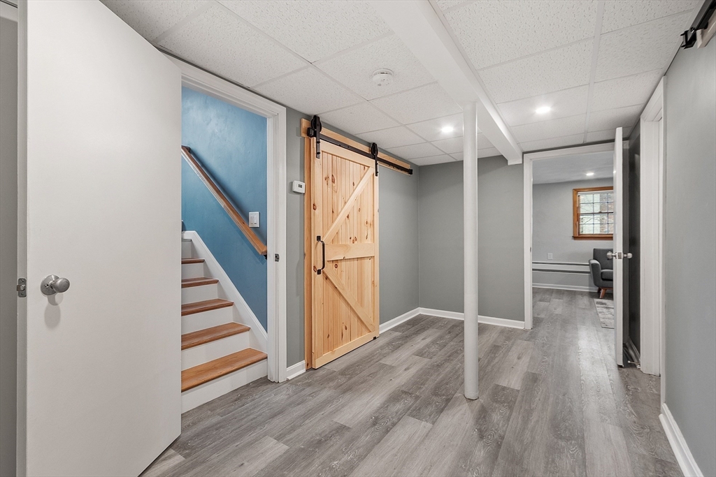 16 Michael Road Maynard, MA 01754 - Photo 16 of 39 a view of entryway with stairs and wooden floor