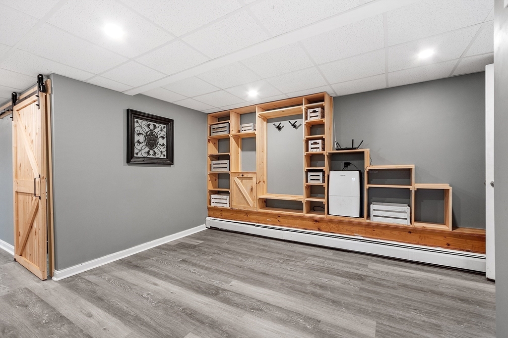 16 Michael Road Maynard, MA 01754 - Photo 18 of 39 a view of a livingroom with wooden floor